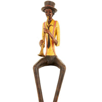 Trumpet Player Figurine Sitting