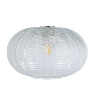 Clear glass pendant light above kitchen island