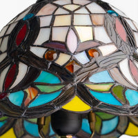 Stained glass lamp with multicolored geometric design 