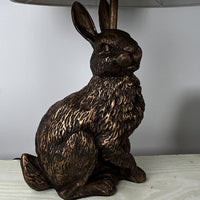 Black and gold rabbit Table lamp with cream shade