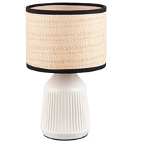 White ceramic table lamp with natural woven rattan shade and black trim