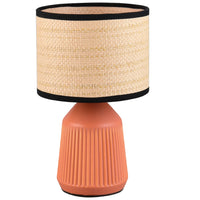 Terracotta ceramic table lamp with natural woven rattan shade and black trim