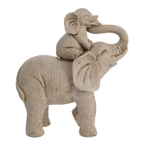 Baby elephant and mother figurine
