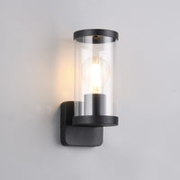 Modern outdoor wall lamp with clear glass cylinder and black metal finish